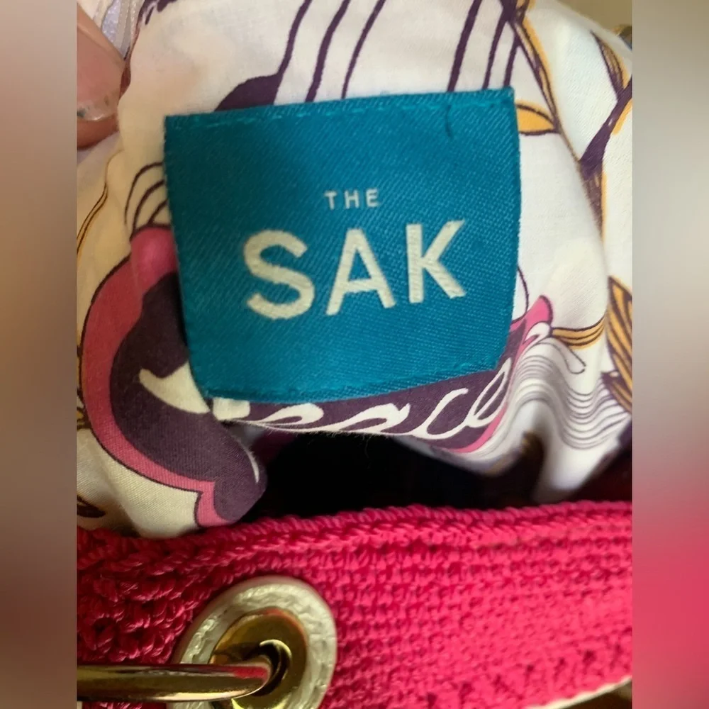 The Sak fuschia crochet purse with gold chains pink y2k
